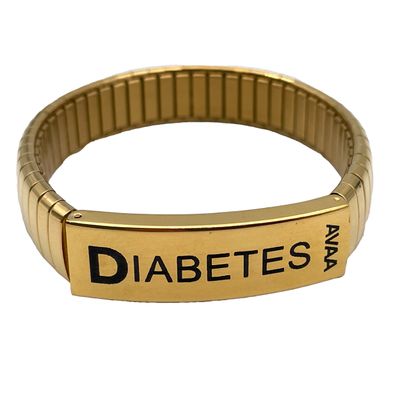 Diabetestunnus, leveä venyvä teräsranneke, kullattu (19,5 cm) Diabetestunnus, leveä venyvä teräsranneke, kullattu (19,5 cm)